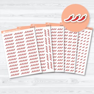 May include: Sheets of stickers featuring red chili pepper designs. The stickers are arranged on white sheets, with a few sheets visible. A circular sticker with three chili pepper stickers is in the upper right corner. The brand name "Orange Umbrella Co." is visible.