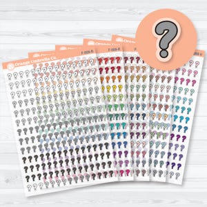 May include: Sheets of colorful question mark stickers in various shades, including pink, blue, green, and gray. The stickers are arranged in rows and columns on white paper. The Orange Umbrella Co. logo is visible.