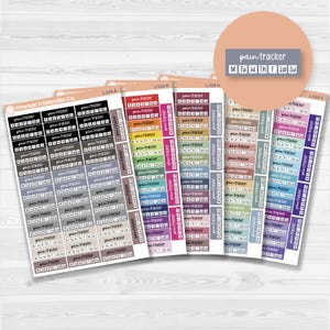 May include: A collection of colorful planner stickers from Orange Umbrella Co. featuring the text "pain tracker" and days of the week. The stickers are in various colors, including black, gray, pink, and blue, and are designed for use in a planner or journal.