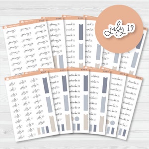 May include: A set of 10 sheets of planner stickers featuring various shapes and sizes of stickers with numbers 1 through 31 for each month of the year. The stickers are in shades of blue, gray, and beige. The text "July 19" is written in black cursive on a peach-colored circle.