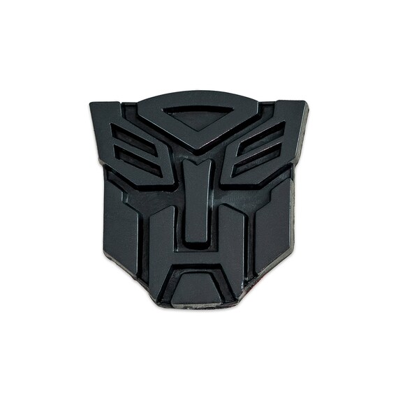 Black decepticon cheap car emblem