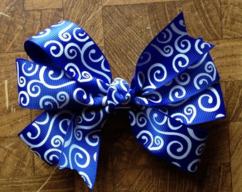 Handmade Blue and white pinwheel hairbow attached to alligator clip