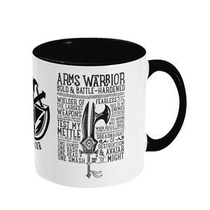 Puede incluir: Taza de cerámica blanca con interior y asa negros. La taza presenta un diseño gráfico en blanco y negro con el texto "Arms Warrior Bold & Battle-Hardened" y otro texto.