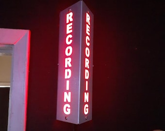 Lighted Sign &quot;RECORDING&quot; Aluminum 120V. Remote and/or Bluetooth controls. Triangle Wall Sconce. 11 inches tall. Variable colors/modes Timer.