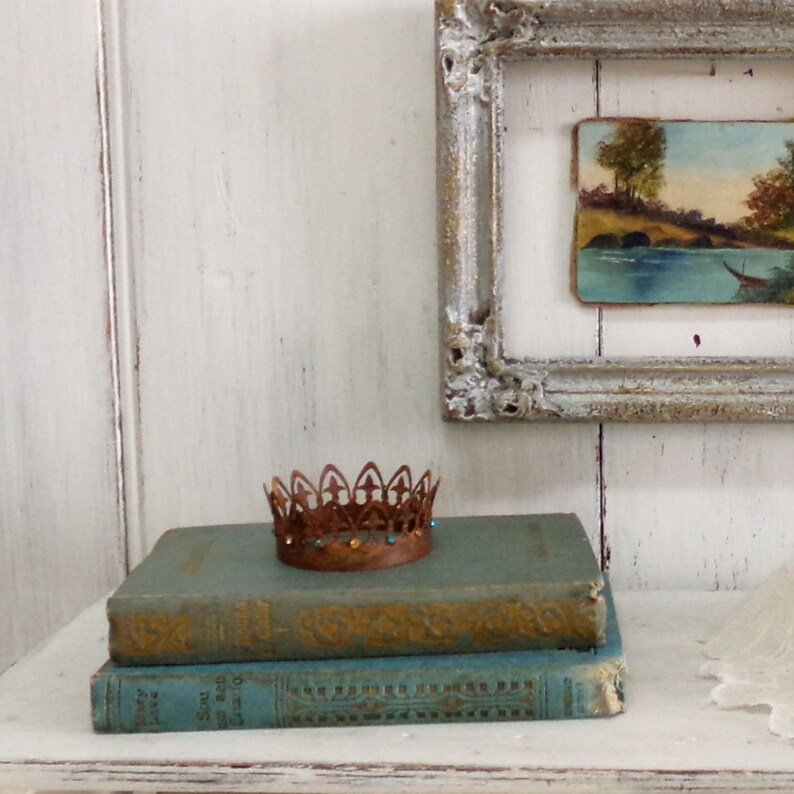 Vintage rusted Crown rhinestones statue decor