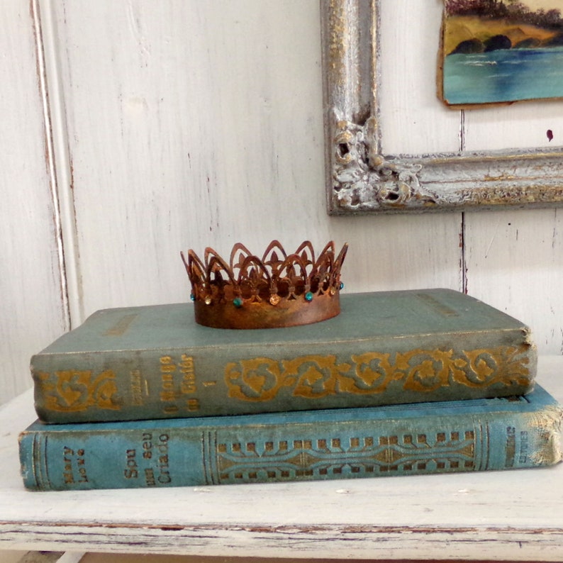 Vintage rusted Crown rhinestones statue decor