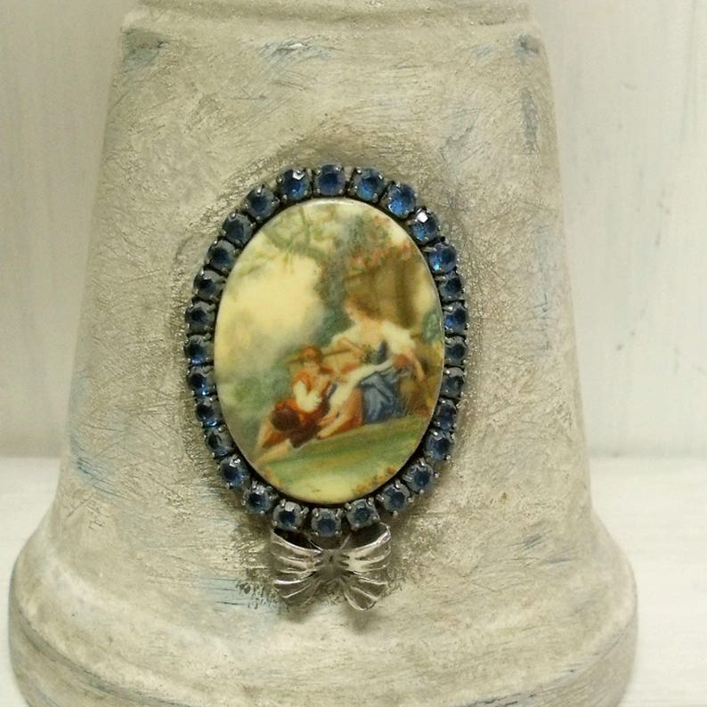 Vintage aged Trophy cups Cameo rhinestones pair