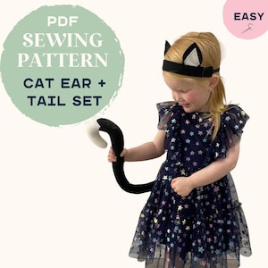 May include: A child wearing a black cat ear headband with white inner ears and a black and white tail. The child is wearing a navy blue dress with a star pattern. Text on the image reads "PDF Sewing Pattern Cat Ear + Tail Set" and "EASY".