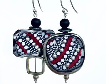 Large asymmetrical earrings in black, white & grey satin finish textile on lightweight silver bead, embellished with silver