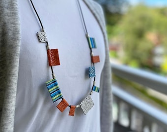 Long colourful necklace, asymmetrical, paper & rubber cord necklace, crafted from colourful Japanese papers (lacquered) and silver beads