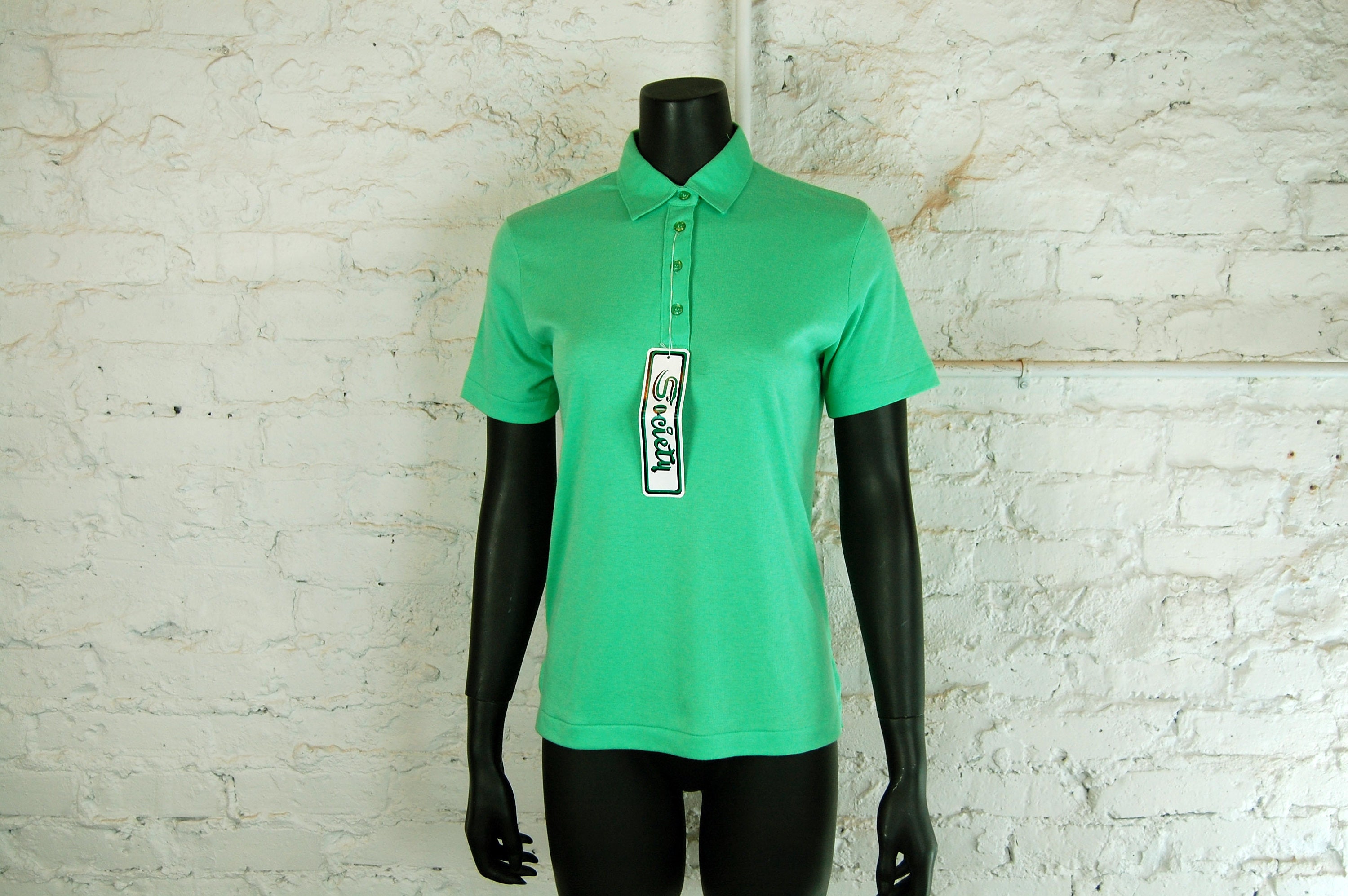 mint green women's polo shirt