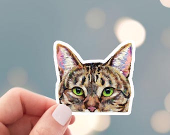 Peeking Brown Tabby Cat Sticker - Die Cut Vinyl, Weather Proof, Water Resistant, Small Tabby Cat Face Peeking Over Edge Tiny Sticker