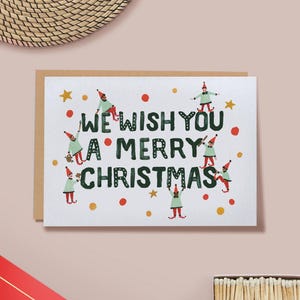 Wij wensen je een vrolijk kerstfeest Speelse elfenkerstkaart