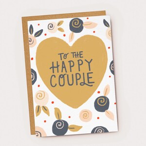 A la tarjeta de boda y aniversario de la pareja feliz