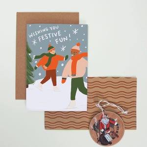 Ik wens je een feestelijke kerstkaart voor schaatsers