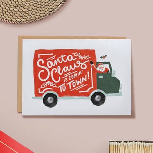 Le Père Noël arrive en ville ! Carte de voeux de Noël