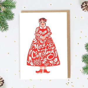 Cartão de Natal da Mulher do Povo Vermelho