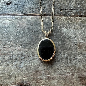 14k Yellow gold 21&quot; long chain with 14k yellow gold Black Onyx 1&quot; pendant