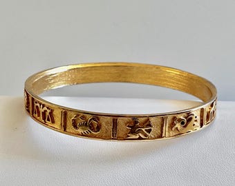 Pulsera rígida vintage Crown Trifari con símbolos del zodíaco, pulsera rígida Crown Trifari dorada con horóscopo (difícil de encontrar)