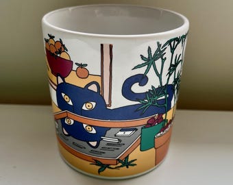 Taza vintage de Taylor and Ng Drug House con diseño de gato: 1981. Diseño de Pot House por Win Ng.