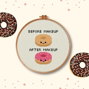 May include: A white embroidery hoop with the text "Before Makeup" and "After Makeup" and two donuts, one plain and one with pink frosting and sprinkles.