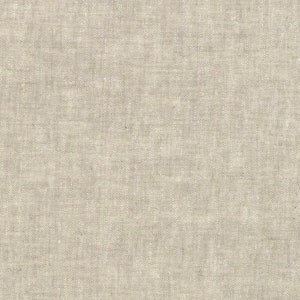 May include: A close-up of a plain, off-white linen fabric with a subtle woven texture.