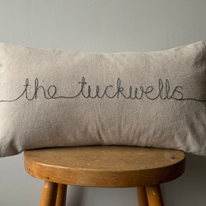 Personalised Hand Embroidered Family Name Cushion Cover in “flax” linen