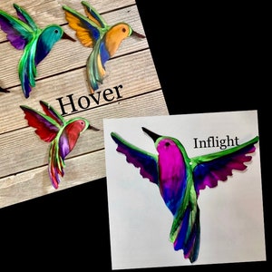 Hovering and inflight metal hummingbirds.