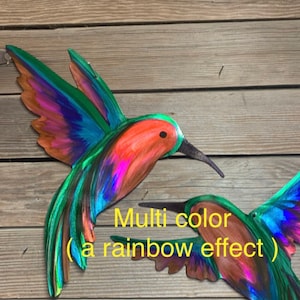 Multiple colors or rainbow effect metal hummingbirds.