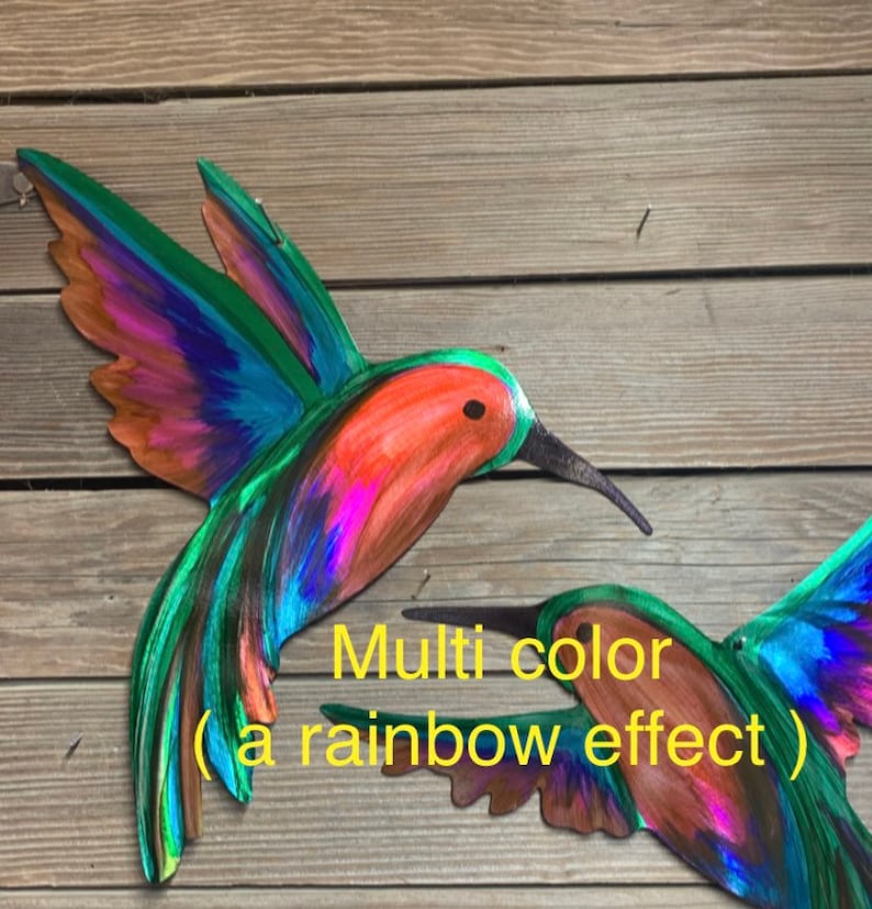 Multiple colors or rainbow effect metal hummingbirds.