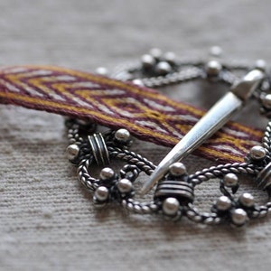 replica of medieval brooch