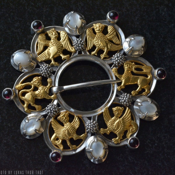 Rich medieval brooch