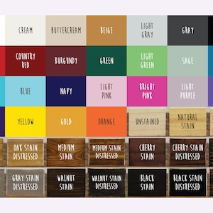 May include: A color chart featuring a variety of hues, including white, red, and blue, with each color displayed in a labeled rectangular block. The chart also includes various wood stain options.