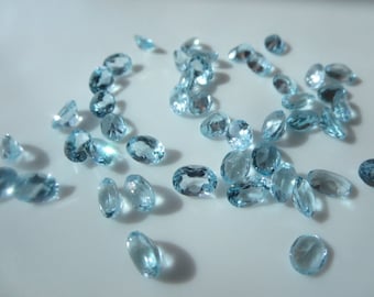 Natuurlijk hemelsblauwe topaas ovaal 7 x 5 mm - 10 stuks