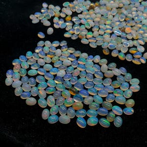 Opale etiope naturale di qualità AAA+++, forma ovale, cabochon da 7 x 5 mm, pietre preziose sciolte di alta qualità, per la creazione di gioielli e come regalo.