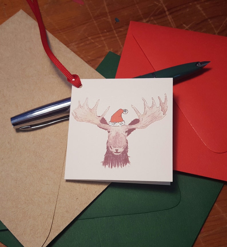 Moose in a Santa hat enclosure card