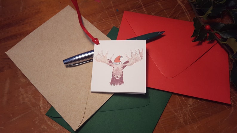 Moose in a Santa hat enclosure card