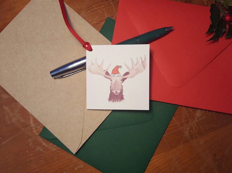 Moose in a Santa hat enclosure card