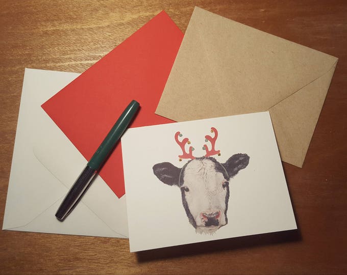 Holiday Cow folded note cards with your choice of envelope color.