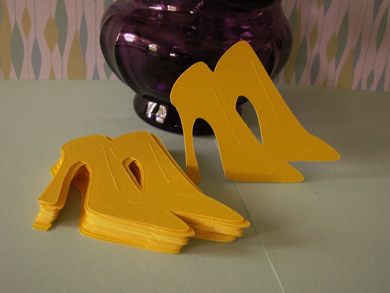 2521/2 inch pair of yellow high heel shoes image 1