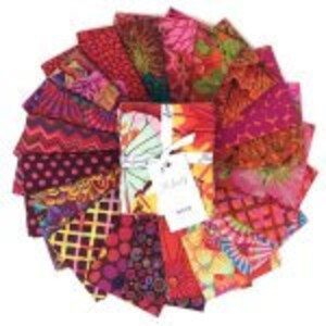 May include: A pack of 20 assorted fabric squares in various shades of red, orange, and purple. The fabric squares feature a variety of patterns, including floral, geometric, and paisley.