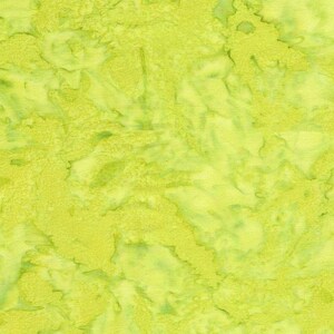 May include: A green fabric with a marbled pattern. The fabric has a light green base with darker green swirls and streaks.