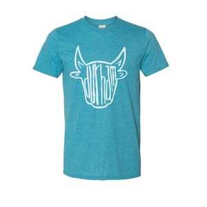 May include: A teal blue t-shirt with a white outline of a bull's head. The word "Durham" is spelled out inside the bull's head.