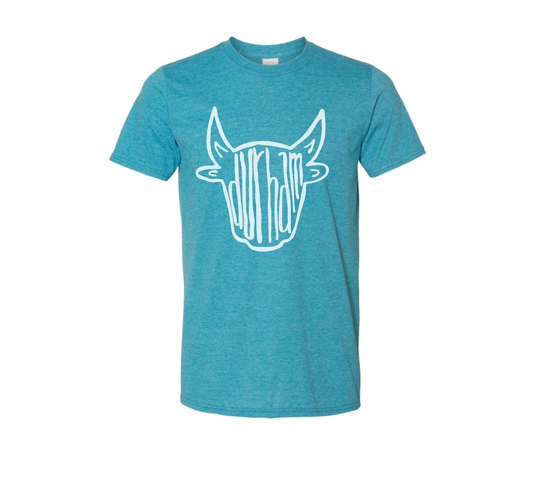 May include: A teal blue t-shirt with a white outline of a bull's head. The word "Durham" is spelled out inside the bull's head.