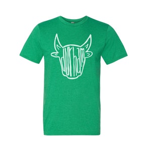 May include: A green t-shirt with a white bull's head graphic. The bull's head is made up of the word "Durham" in a stylized font.