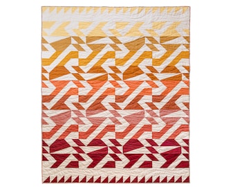 May include: A geometric quilt with a gradient of colors from yellow to red. The quilt is made of squares and triangles, and the pattern is repeated throughout the quilt.