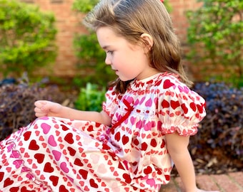 Valentine Clara Dress in Soft Knit Cotton Heart Pattern with Red Ribbon - Christmas, Everyday, Nutcracker, baby girl dress