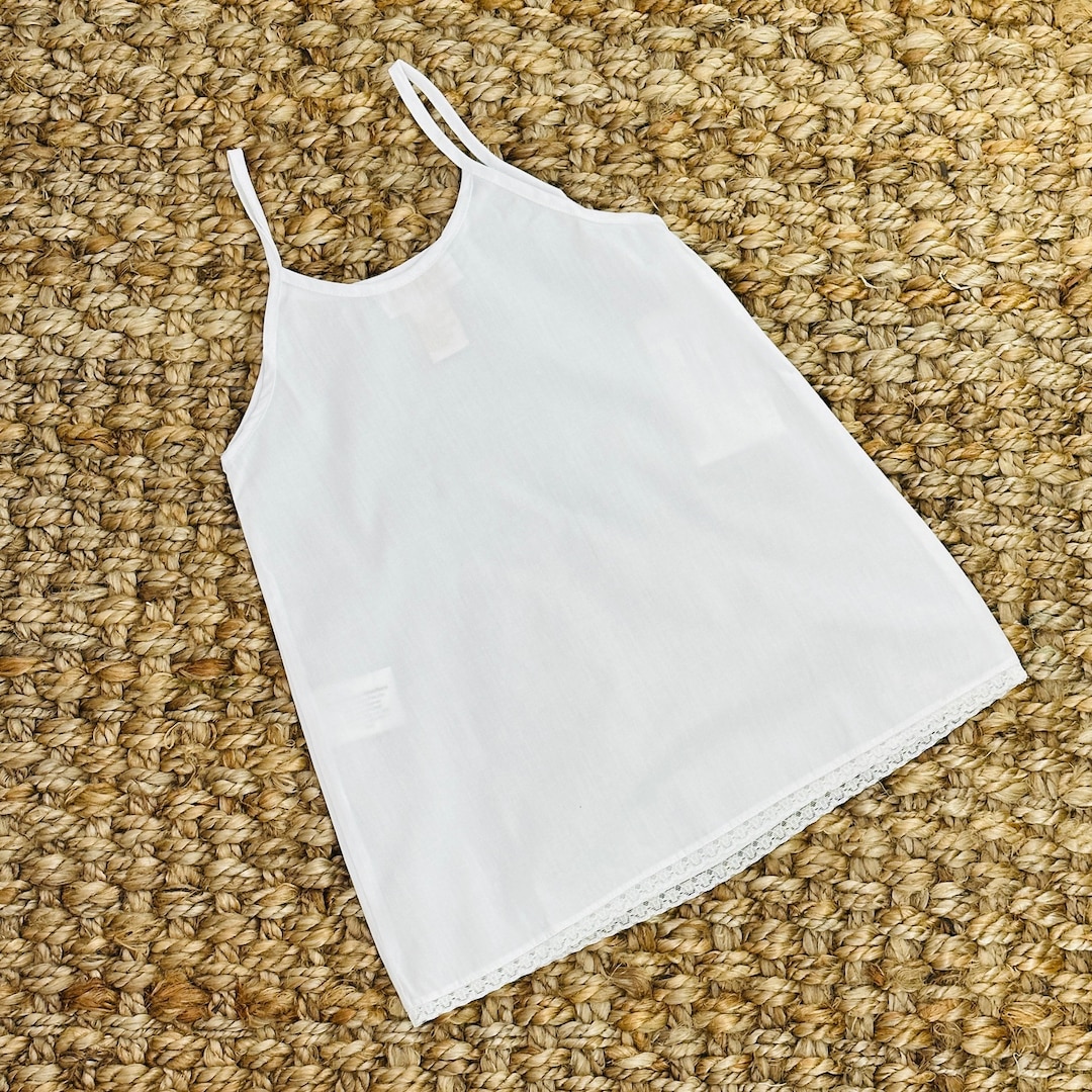 girls white slip ons