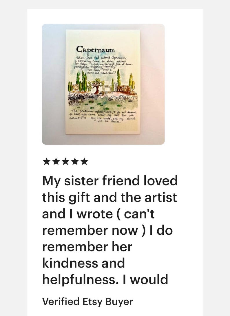 May include: A cream-colored card with the word "Capernaum" at the top, followed by handwritten text and a small illustration of a landscape with trees and buildings. The card also includes additional text.