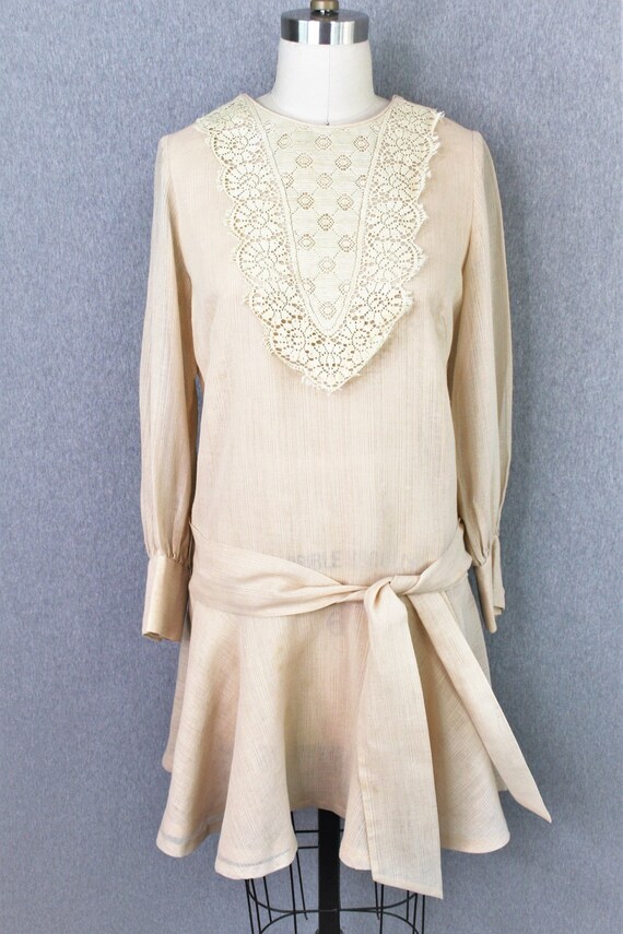 drop waist babydoll dress Gabby Strapless Twist Front Babydoll Dress main image 1